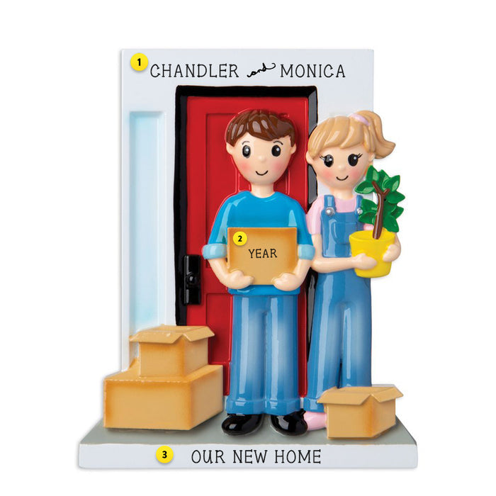 New Home Couple with boxes outside front door resin ornament  Edit alt text