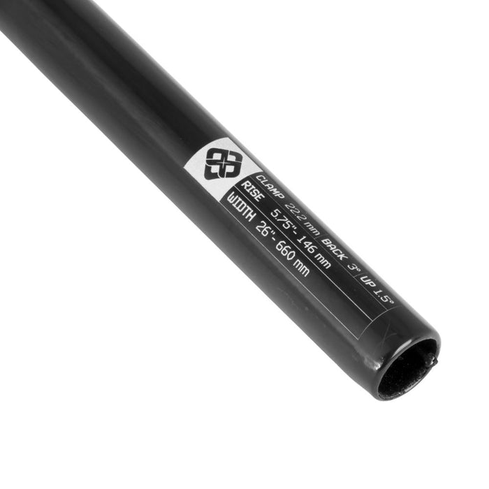 Close-up of the Pride 373 Blanc Replica Alloy Bar (22.2mm Clamp)—a black replica alloy handlebar with a printed label displaying clamp, rise, back, up, and width specifications in white text. This bar features subtle backsweep handlebars for enhanced comfort and control.