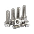 Five screws from the Pride Stem Titanium Screw Kit - Cayman V2 / FTL, with one screw lying horizontally in front and four standing upright in the background.