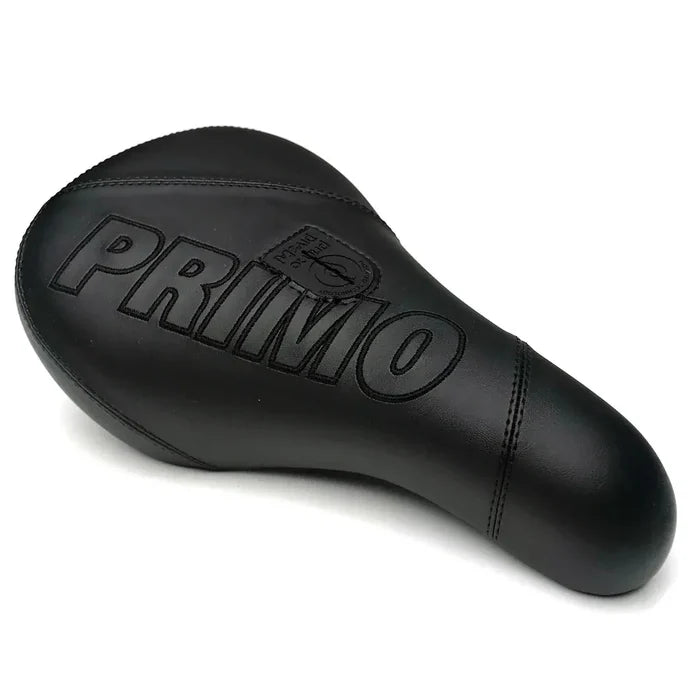 The Primo Breaker Pivotal Seat is a black BMX seat with “PRIMO” embossed on top, showcasing visible stitching and a textured leather-like surface. This fat pivotal seat is designed for style and comfort, offering a durable option for your bike.