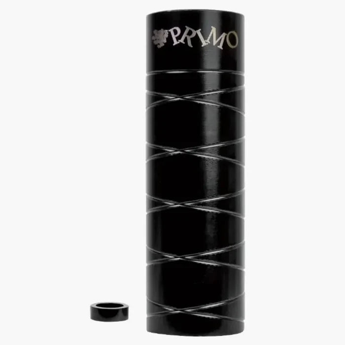 A cylindrical black metal container with silver diagonal lines, featuring the word “PRYMO” on top and a detached round cap beside it—evoking the sleek design and sturdy construction of Primo Master Pegs built for a 14mm axle.