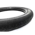 A close-up of the Primo Richter 20 Inch Folding Tyre (20x2.4), showcasing its textured, perforated surface and patterned tread, with a lightweight folding Kevlar bead, displayed on a white background.
