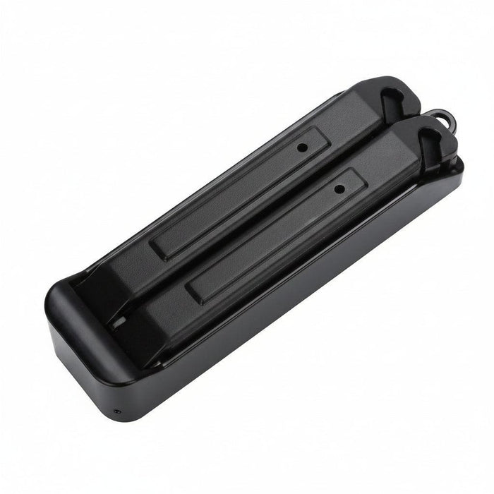 The Puncture Repair Kit includes a handheld knife sharpener with two red sharpening rods and a black plastic base—perfect for keeping your tools in top condition when prepping gear or using tyre levers.