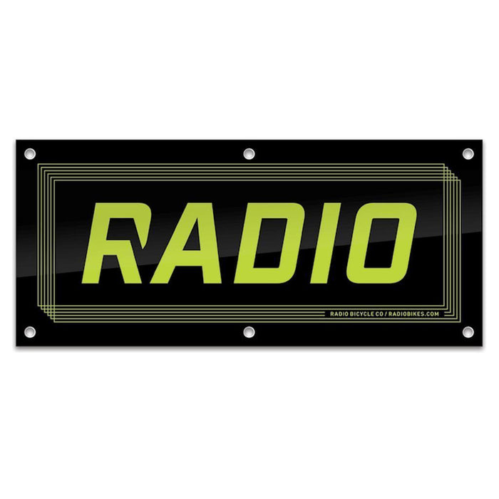 The Radio Shop Banner features "RADIO" in bold yellow-green letters on a black rectangular background with a thin geometric border—ideal for shop displays or as an eye-catching banner for event decor.