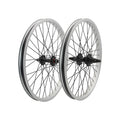 The Redline Pro Wheel Set features black and silver 20" BMX wheels with spokes, displayed side by side on a white background—an affordable option for your next ride.
