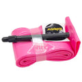 A rolled pink RideNow TPU 24 Inch Tube with a Presta (French) valve and black valve stem, secured by clear tape, is positioned on a white background—an excellent option for cyclists seeking ultra lightweight inner tubes to reduce bike weight.