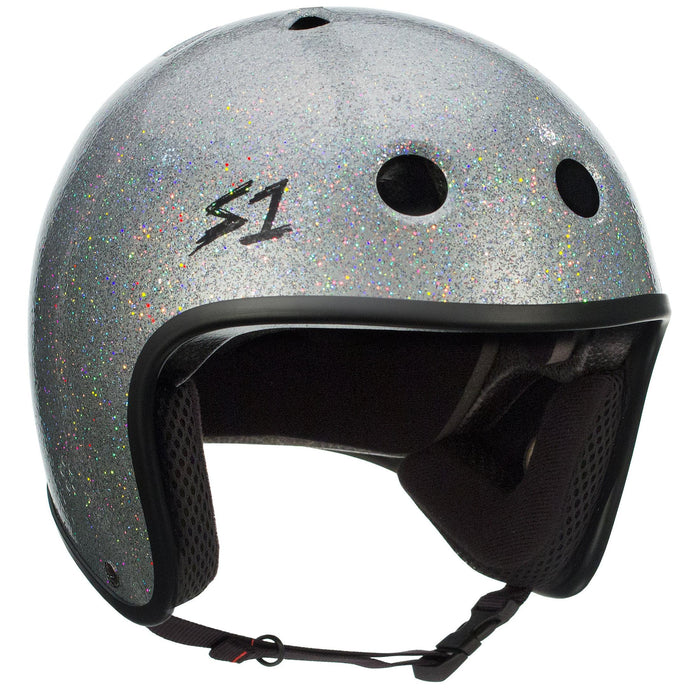 A silver multi-impact helmet with a glittery finish, featuring ventilation holes, soft interior padding, and an adjustable chin strap. The S-One Helmet Retro Lifer Silver Gloss Glitter boasts high-impact protection and a stylish "S1" logo on the side.