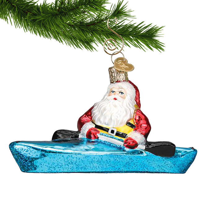 Santa in a Kayak Glass Christmas Ornament
