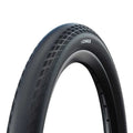 Close-up of a black Schwalbe SX-R 20 Inch Tyre with a textured tread pattern, shown against a white background.