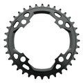 SD Chainring V3 CNC 6061 4 Bolt in black metal, featuring 32 teeth, multiple circular cutouts, and mounting holes, photographed on a white background.