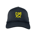 The S&M Rambler Sharpie Shield Cap is a black mesh-back hat with a yellow stylized shield and letter design on the front panel. It features an adjustable snapback closure for comfort, breathability, and a perfect fit.