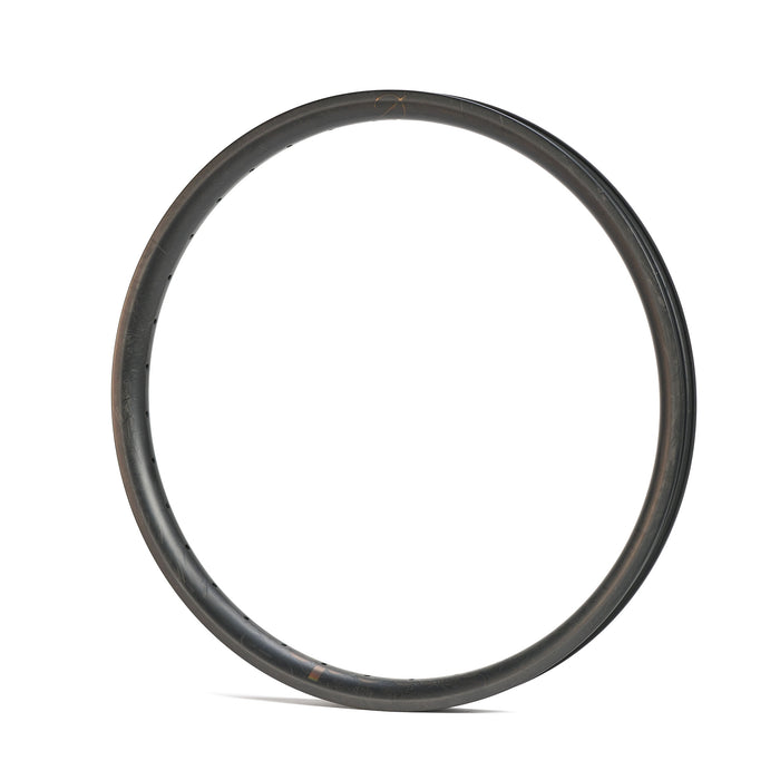 The Spectre V3 Lite Carbon Fiber 20 Inch 36H Brakeless Rim, in black T800 carbon fiber, is pictured upright on a white background with no spokes, tire, or hub visible.