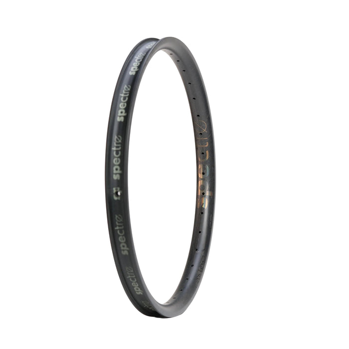 A single Spectre V3 Lite Carbon Fiber 20 Inch 36H Brakeless Rim in black stands upright against a plain white background. Crafted from premium Toray T800 carbon fiber, this lightweight rim features multiple spoke holes along its edge and is distinctly labeled "spectre.