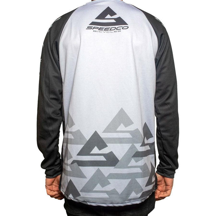 The back of a man wearing a Speedco Race Jersey in custom racing colors.
