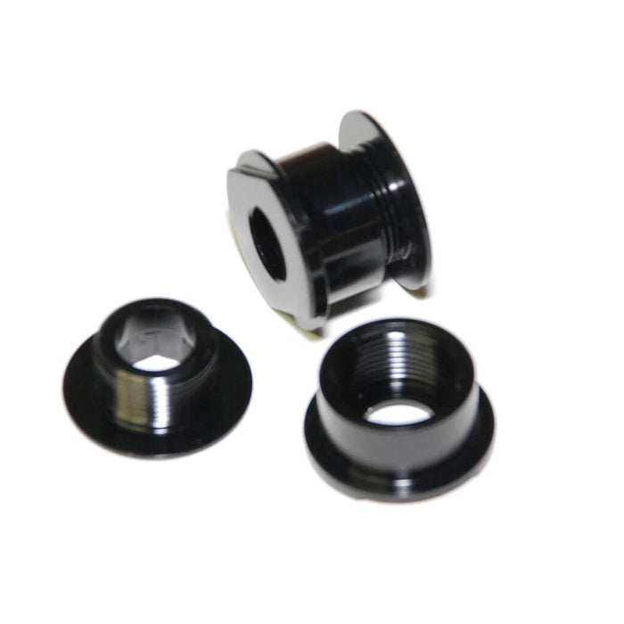 Three black metal bike chainring bolts are displayed on a white background, with two flat and one upright to reveal the threads—perfect for use with the Speedline 20-10mm Fork Adapter.