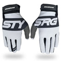Introducing the Staystrong Glove Classic White: These cycling gloves feature a black, gray, and white design with “STAY STRONG” and “STRG” printed on the tops. Designed with Velcro wrist straps for a secure fit, these V5 gloves provide superior protection for both track training and road riding.