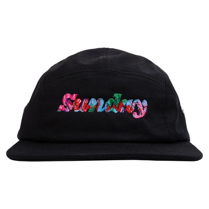 The Sunday Classy Scribble Cap is a black 5 panel cap with "Sundays" embroidered in colorful, textured letters and a clip strap back—perfect for your back to school collection.