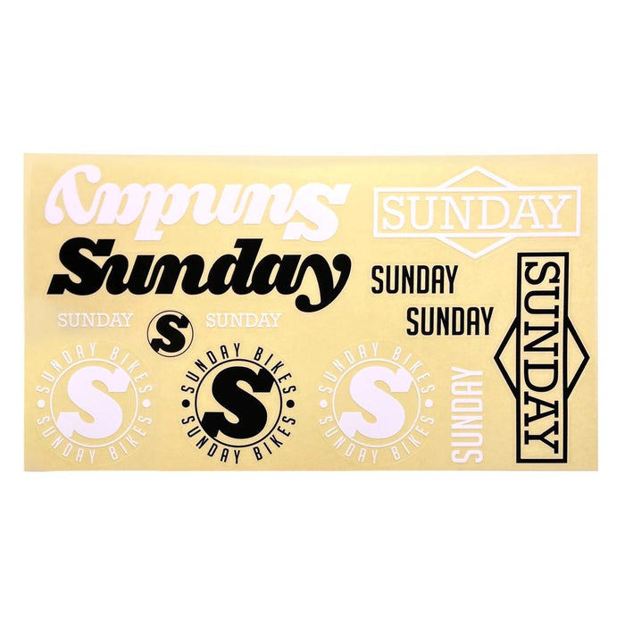 The Sunday Logo Sticker Pack includes 13 assorted "Sunday" and "Sunday Bikes" logo stickers in various fonts, sizes, and colors on a yellow background.