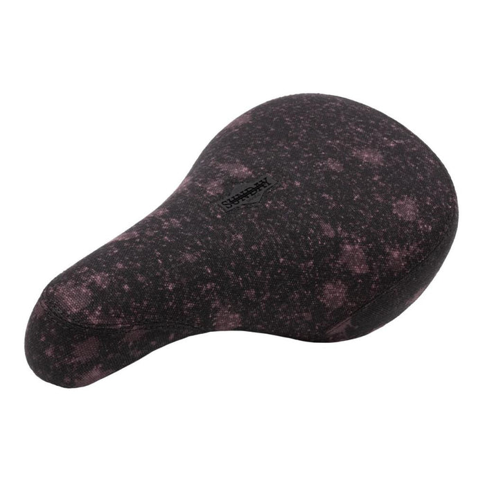The Sunday Pivotal Seat (Brett Silva Signature) is a black custom bike seat with a subtle purple speckled pattern and "STREET" printed on top, inspired by Brett Silva's design.