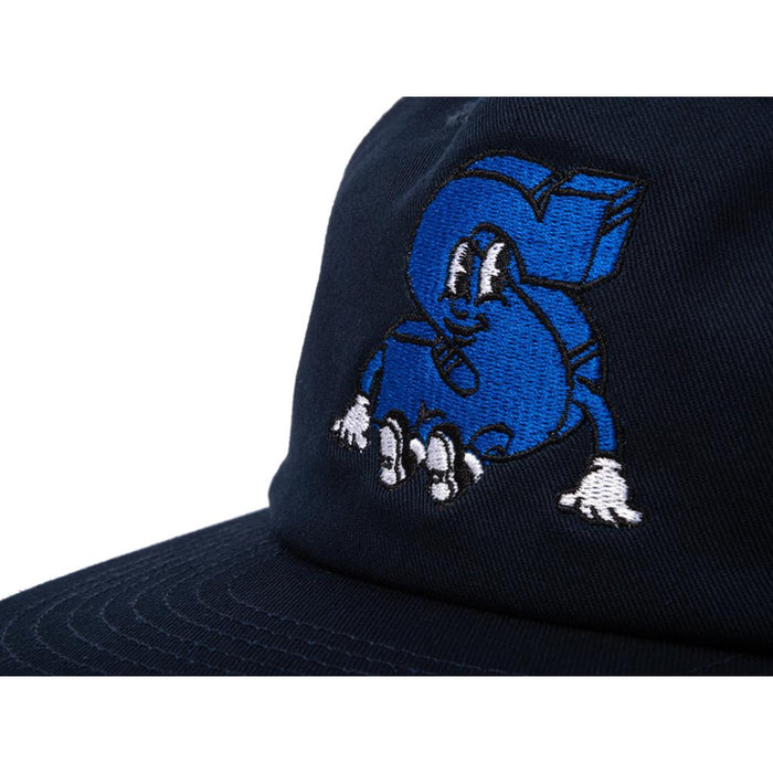 The Sunday S Man Unstructured Cap is a navy blue dome cap with an embroidered blue cartoon "S" sporting white gloves, shoes, and a smiling face—a fun new look from our Sunday caps collection.