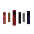 Six Tenet Components Icon Grip mountain bike grips in assorted colors—red, brown, black, gray, and purple—are arranged upright on a white background. Designed with extra-soft rubber for optimal comfort and control, these lock-on grips ensure a secure fit for every ride.