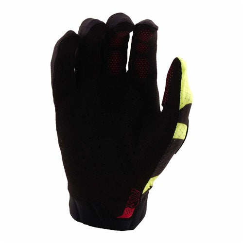 The TLD 26.1 Air Glove / Cyclops Black features yellow accents on the index finger and thumb, a single-layer palm for comfort, and is shown with the palm facing inward against a white background.