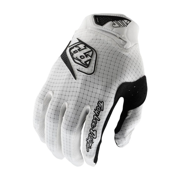 The TLD 26.1 Air Glove Mono White features black accents and logos, a grid-like texture, and a secure wrist strap—ideal for Troy Lee Designs fans or anyone seeking high-performance mountain bike gloves.