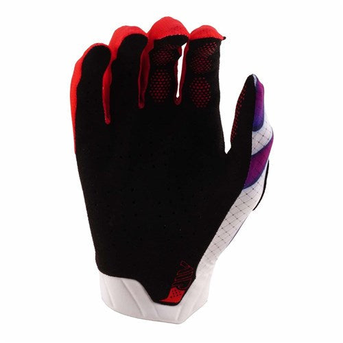 A single TLD 26.1 Air Glove in Overspray White/Violet, shown upright with the palm facing away, features a black body, red fingertips, a white wrist, and purple accents on the side.