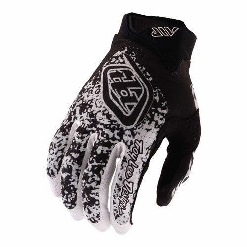 The TLD 26.1 Air Glove / Sever Black/White features a bold black and white pattern with the Troy Lee Designs logo, ideal for mountain biking, motocross, or cycling.