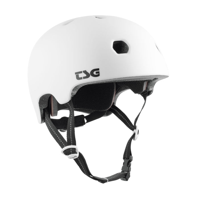 The TSG Meta Helmet in Satin White features ventilation holes, lightweight In-mold construction, adjustable black straps, a Dial Fit System, and buckle for reliable head protection during sports activities.