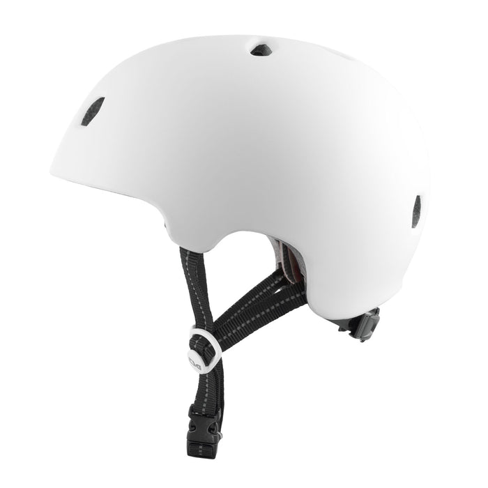 The TSG Meta Helmet in Satin White is shown from the side, featuring black adjustable chin straps, ventilation holes, and a Dial Fit System for added comfort.