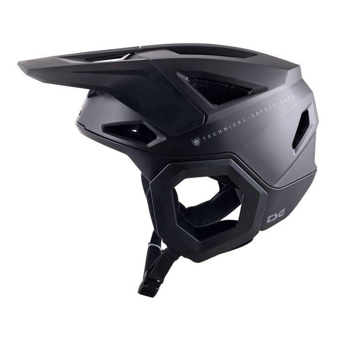 The TSG Prevention Helmet Satin Black is shown from the left side, featuring a visor, ventilation system with side openings, and an adjustable chin strap.