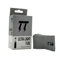 A folded Twitch Lightweight Tube (24 x 1-1/8 - 1-3/8 Inch) and its "Ultra Light Tube" packaging, showing a Presta valve. Designed for 24-inch tires, this super light tube helps reduce rotational weight.