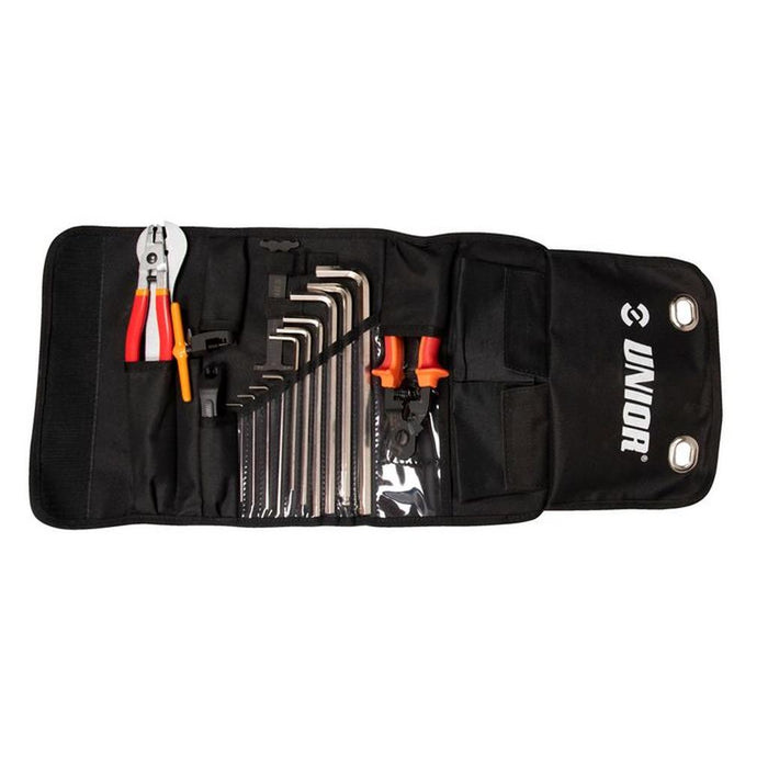 The Unior Race BMX Tool Roll Set in black includes pliers, a wrench, Allen keys, and other hand tools neatly organized in separate compartments for easy access.