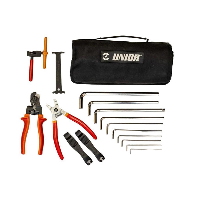 The Unior Race BMX Tool Roll Set includes a black roll-up pouch, pliers, cable cutter, two tire levers, chain tool, chain checker, and assorted hex wrenches—essential for quick BMX repairs on the go.