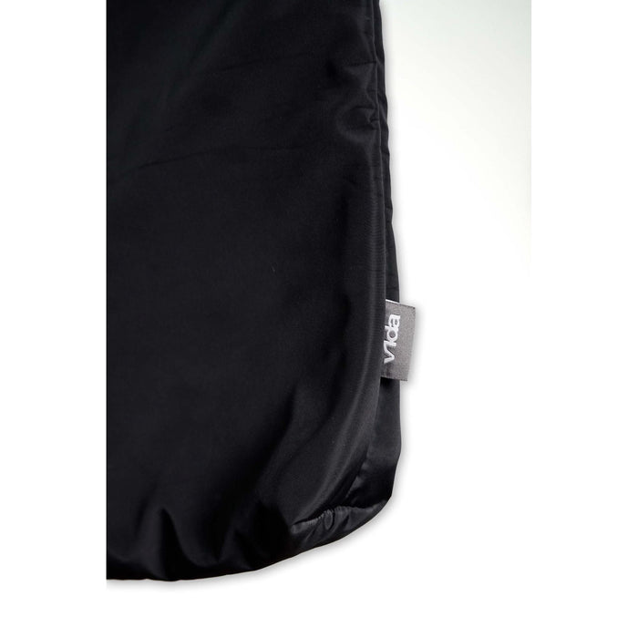 A close-up of the V1da Everything Messenger Bag, a black minimalist design with a small gray "Voda" tag on the edge, displayed against a white background.
