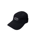 The V1da We Never Run Cap is a black nylon baseball cap with a curved brim, front "vindico" logo patch, and breathable panel for comfort.