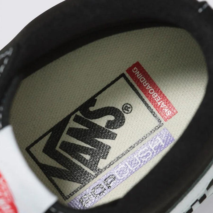 A close up of Vans Pro Skate Classics Sk8-Hi Shoes - Black/White sneakers.