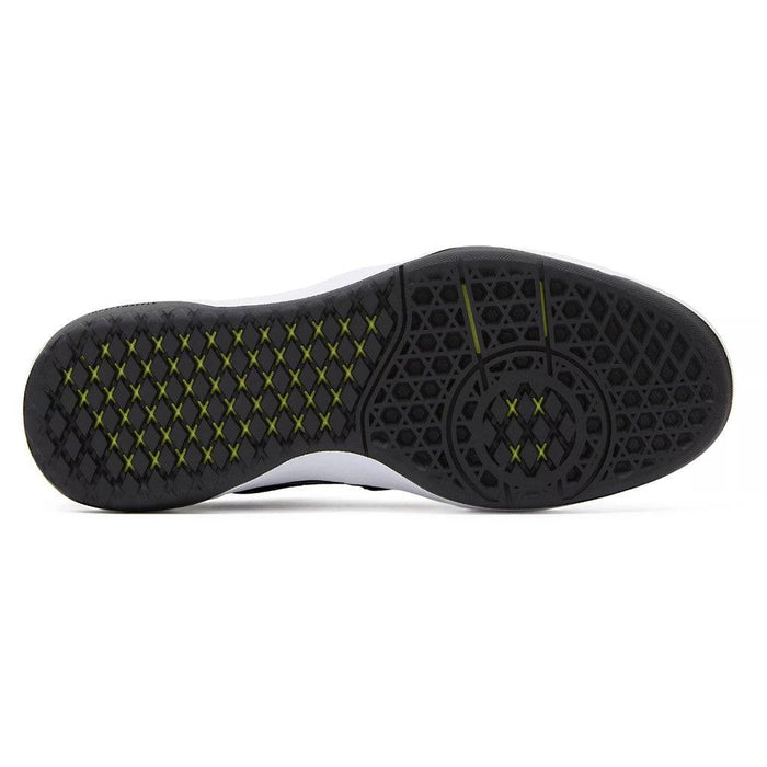 The back of a white Vans Rowan 2 shoe with yellow soles.