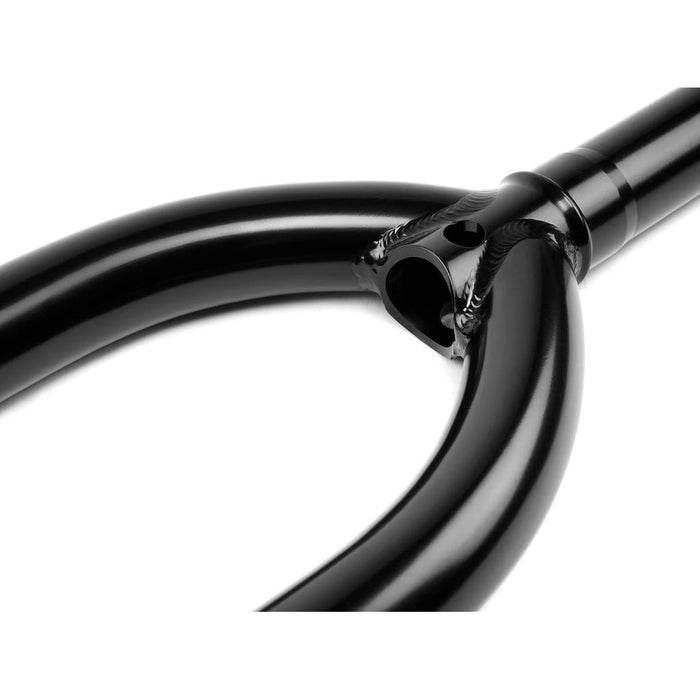 Close-up of the Wethepeople Flash Forks BMX fork in black metal, showcasing smooth welds and a glossy finish on this lightweight component.